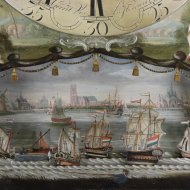Longcase clock by 'Gerrit Vos, Amsterdam', with ships automation and fishing man under the ring.