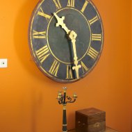Antique dial of tower clock with gilded hands and working.