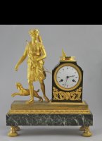 Gilded mantelclock, godess 'Diana' the hunters with sundial.