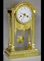 Mercury gilded portico mantel clock. ca 1810