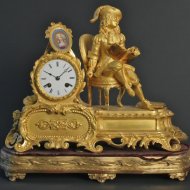 Firegilded french clock. ca 1840