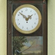 Austian small wallclock with fisher automation.