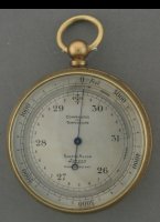 Brass case with silvered dial. Adjustable scale from 0 to 5000 Feet