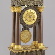 Brass casted french portico mantel clock in gothic style.