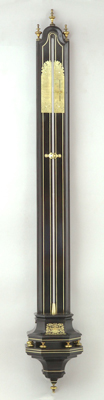 Important early french barometer (ca. 1690-1710) with family-crest of the Plasson-family in the old Forez province.
Ebony veneer with brass inlay, original console, brass adjustable plates, wooden mercury-reservoir.
On top of the crest is a miter and a staff, indicating Plasson was an abbot.