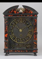 Pieter Visbach Hague Clock with brass dial plate (37,4 x 20,5 cm), covered with black velvet and turning on hinges, gilt brass skeleton chapter ring, with the even minutes numbered (2 x 60 minutes), with the minute hands revolving once in two hours. Gilt brass hands and gilt brass skeleton signature, signed: Pieter Visbach Haghe.
Only a few Haghe Clocks have this 2 x 60 minuts feature. The book 'Spring-driven Dutch Pendulum Clocks' by Dr. R. Plomp  mention three clocks by Pieter Visbagh, one by van Driessen (in the Vehmeyer collectie) and one by Claude Pascal. The Vehmeyer collection (book) describes 49 Haghe Clocks and here is another one by Pieter Visbagh.
Case: Veneered with ebony and red tortoiseshell, 37,4 x 17,0 x 12,5 cm.
Movement: Going and striking trains with four wheels and driven by a single barrel; plates 12,6 x 10,8 cm, back plate signed; Pieter Visbach Fecit Haghae. Striking only the hours, going for 4 days.

Pieter Visbagh (1634-1722) was for 30 years the most prominent watchmaker of the Hague. He was born in this town in 1634 and became apprentice for 6 years of Salomon Coster. In 1652 he left to Middelburg, where he possible worked with Adam Oosterwijck, father of Severijn Oosterwijck. After the sudden death of Salomon Coster in 1659 he came back to The Hague where he took over the house and workshop from the widow of Salomon Coster (Jannetje Hartloop) on the eastside of the Torenstraat, not far from the great church. He took over the apprentice Christiaan Reinaert. Not much later he rented a house in the Wagenstraat/Veerkade and bought it in 1671.
In the following 30 years he became the most prominent clockmaker in the Hague until Johannes van Ceulen became even more famous. Both clockmakers worked for Christiaan Huygens (1629-1695) and both were very productive.

In 1688 The Hague Clockmakers Gilde was founded and Pieter Visbagh became first Master.

Pieter Visbagh (or Pieter Visbach) died in 1722 but he probably stopped working shortly after 1700. 